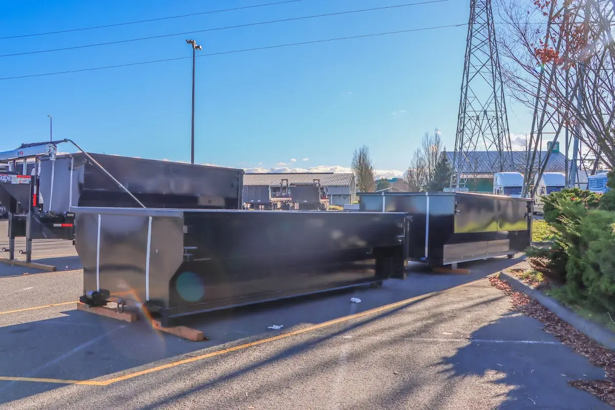 Roll-off dumpster ready for waste disposal at job site for 12 Yard Dumpster Rental in Corbin